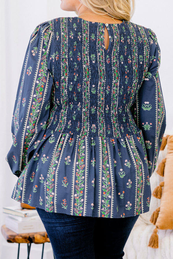 Chic Soul plus size clothing, navy blue long sleeve babydoll top with green, pink, and red floral pattern and cinched top