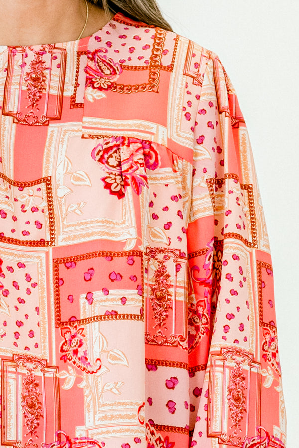 Chic Soul plus size clothing, pink/red bandana paisley print long sleeve top with round neckline with cuff sleeve with ruffle flare detail