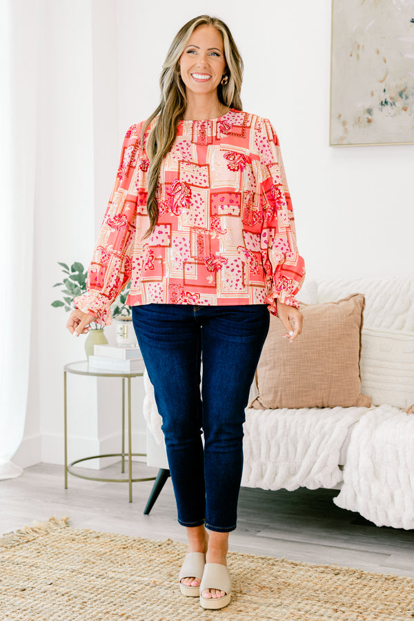 Chic Soul plus size clothing, pink/red bandana paisley print long sleeve top with round neckline with cuff sleeve with ruffle flare detail