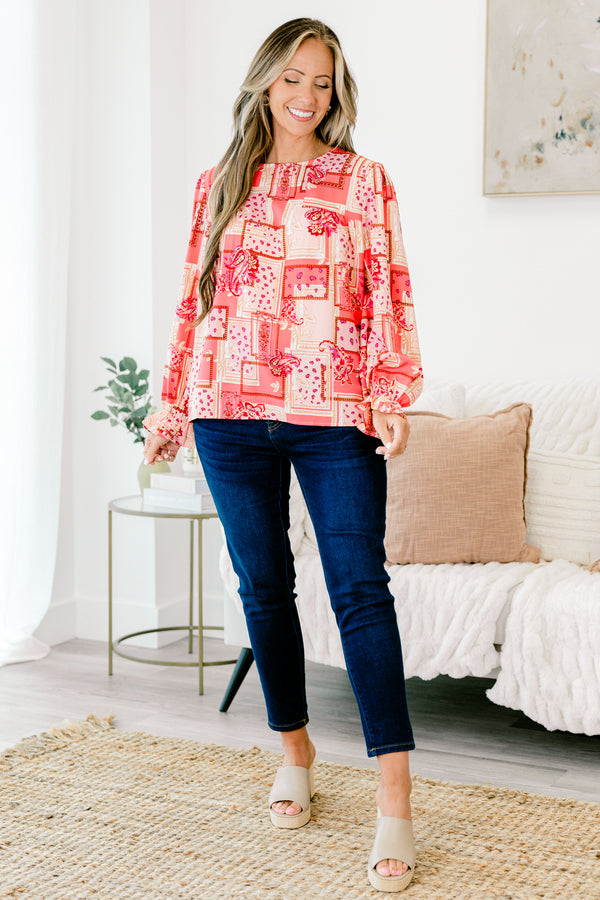 Chic Soul plus size clothing, pink/red bandana paisley print long sleeve top with round neckline with cuff sleeve with ruffle flare detail