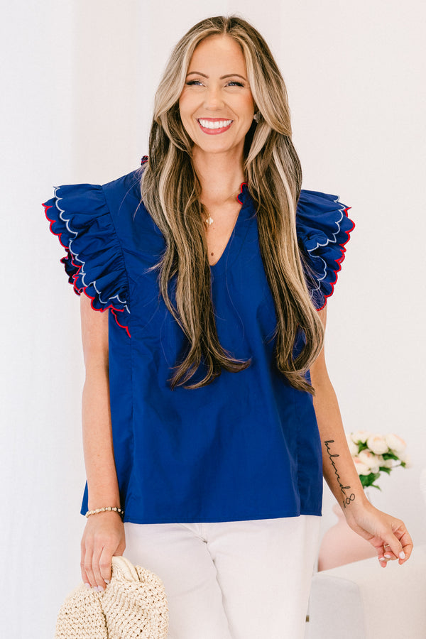 Plus Size navy cotton top with flutter sleeves, scallop trim, and a split v-neckline.