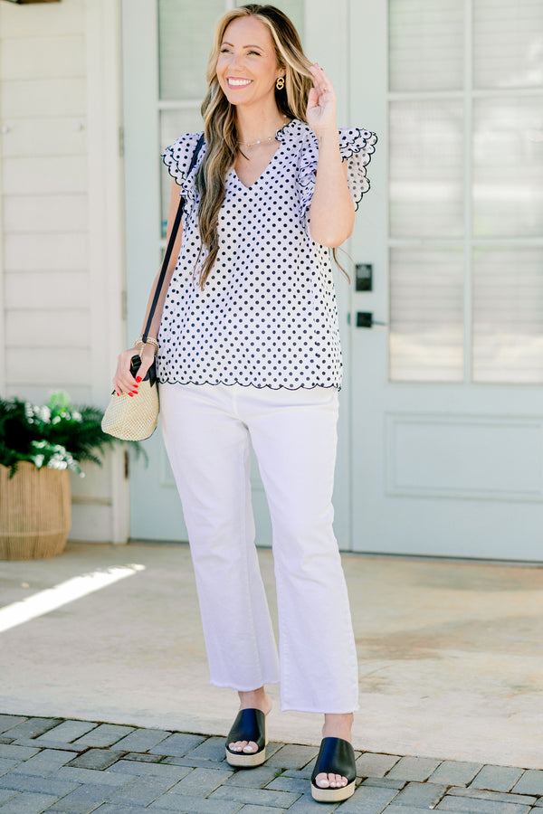 Chic Soul plus size clothing, white v-neck flutter sleeve top with black polka dots and scalloped edges