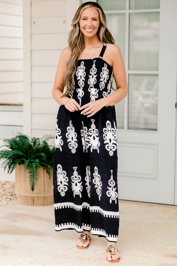 Chic Soul plus size clothing, sleeveless spaghetti strap navy wide leg jumpsuit with a white paisley pattern 