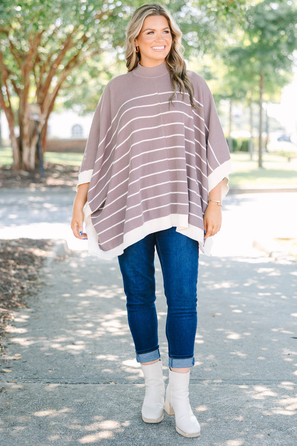 Plus Size brown and white striped knit poncho with a mock neckline and wide sleeves.