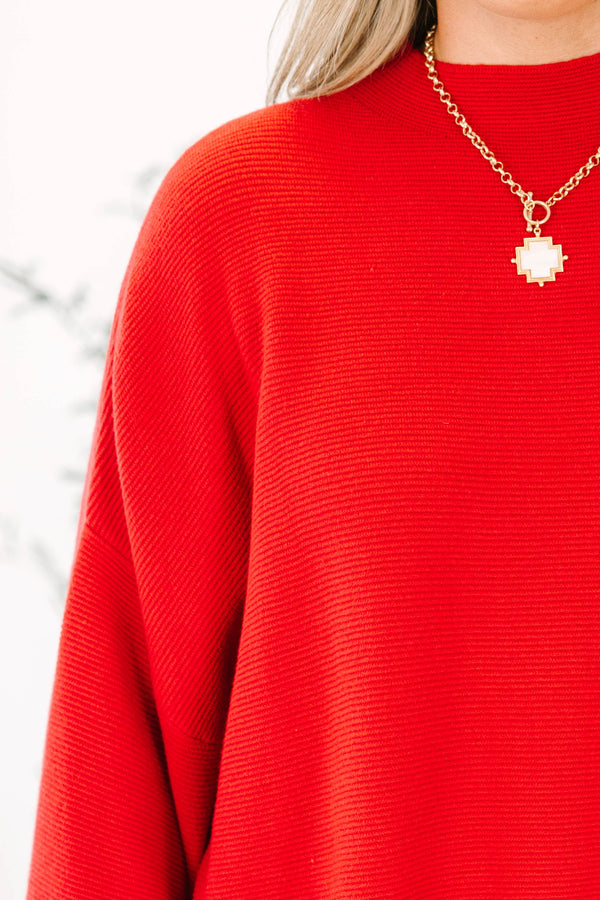 Plus Size wine red ribbed knit sweater with a mock neckline and wide bell sleeves.