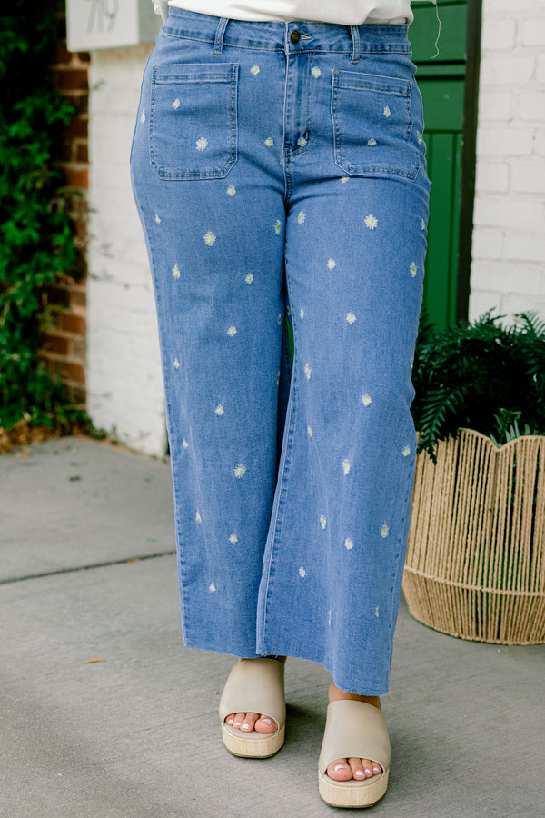 Chic Soul plus size clothing, medium wash wide leg denim jeans with two front pockets with small white embroidered flowers