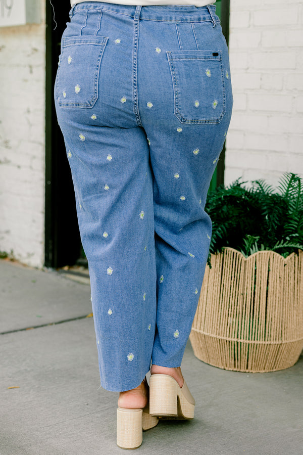 Chic Soul plus size clothing, medium wash wide leg denim jeans with two front pockets with small white embroidered flowers