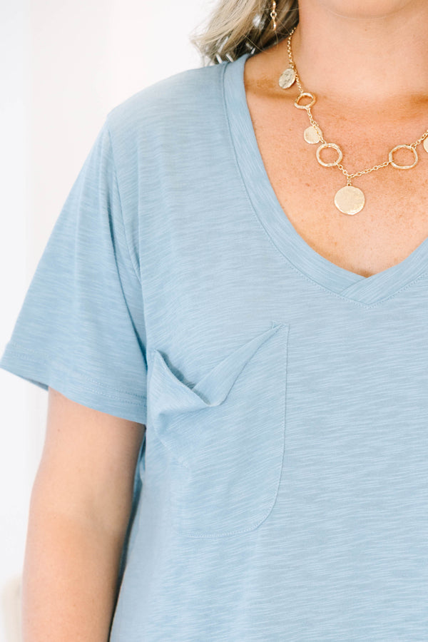 Plus Size dusty blue v-neck top with a relaxed fit, short sleeves, and a front chest pocket.