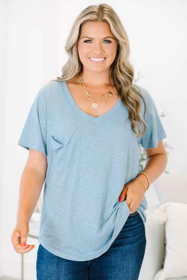 Plus Size dusty blue v-neck top with a relaxed fit, short sleeves, and a front chest pocket.