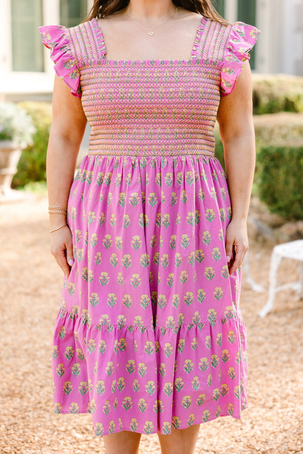 Plus Size pink floral dress with a smocked bodice, ruffle straps, and a tiered midi skirt.