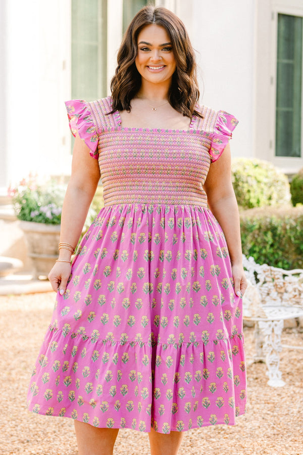 Plus Size pink floral dress with a smocked bodice, ruffle straps, and a tiered midi skirt.