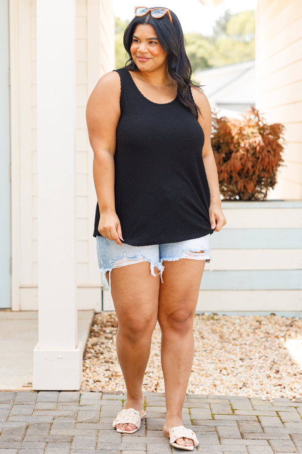 Plus Size black sleeveless tank top with a textured French raised dot print and a scoop neckline.