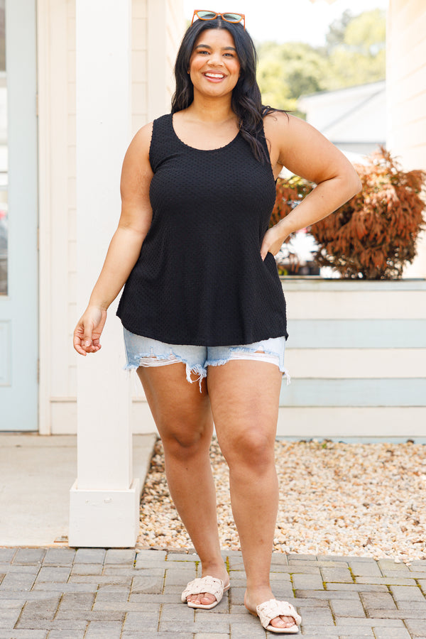 Plus Size black sleeveless tank top with a textured French raised dot print and a scoop neckline.