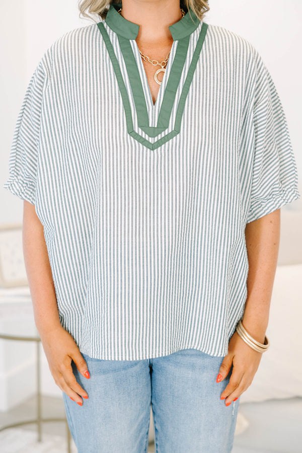 Plus Size hunter green and white striped blouse with a split v-neck and short dolman sleeves.
