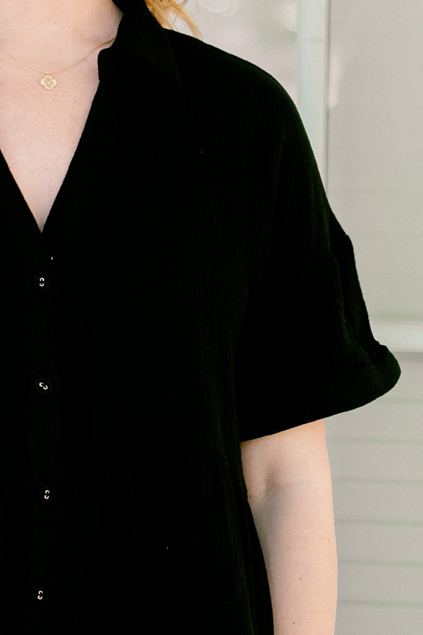 chic soul plus size clothing, black short romper with cuffs at the end of the sleeves and a V-neckline 