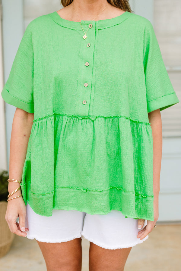 Chic Soul plus size clothing, short-sleeve vibrant green baby doll top with a high-scoop-neckline and brown button detailing with subtle distressed detailing 