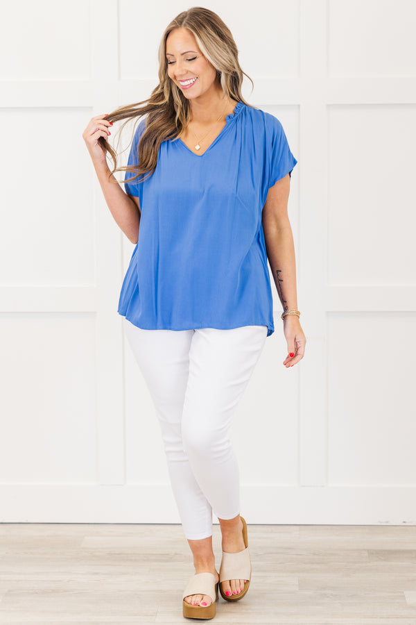 Chic Soul plus size clothing, short-sleeve denim blue top with a v-neckline and ruffled detailing along the collar 