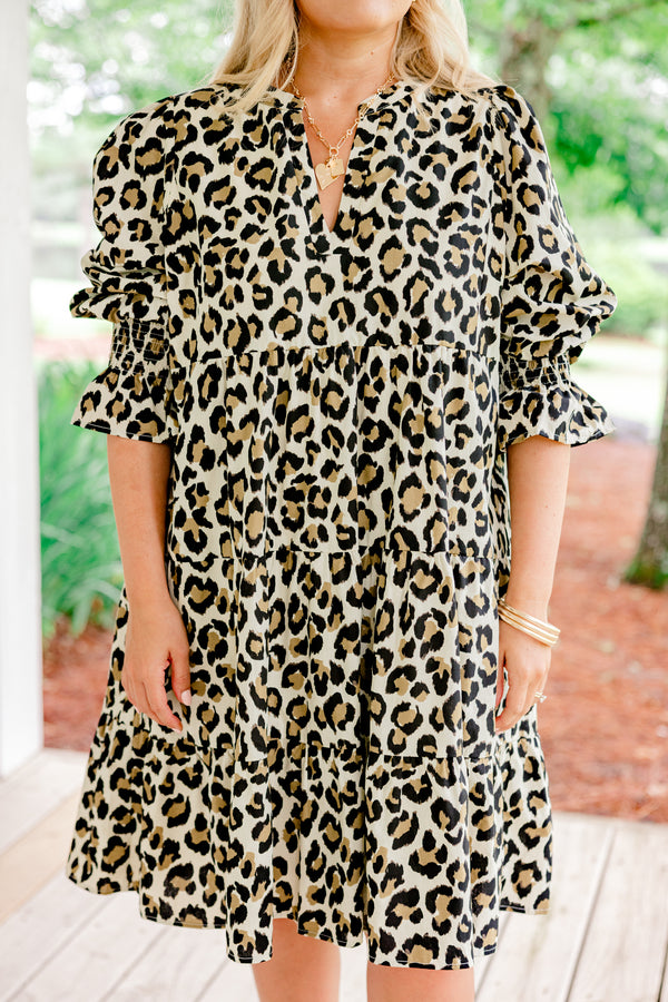 Chic Soul plus size clothing, Short sleeve  leopard print baby doll dress with a ruffle detail at the end of the sleeve and a slight v-neckline 
