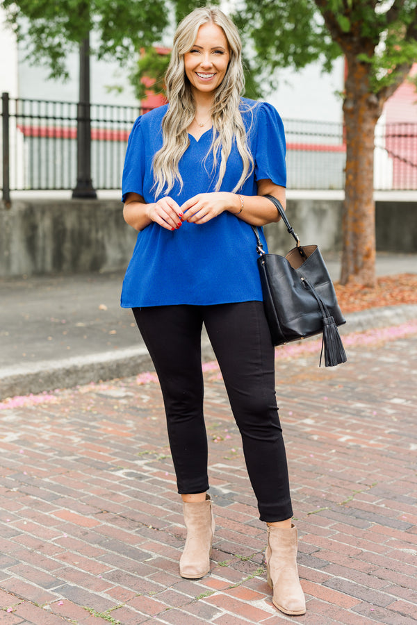 Plus Size blue short-sleeve top featuring a scalloped V-neckline and textured polyester fabric.