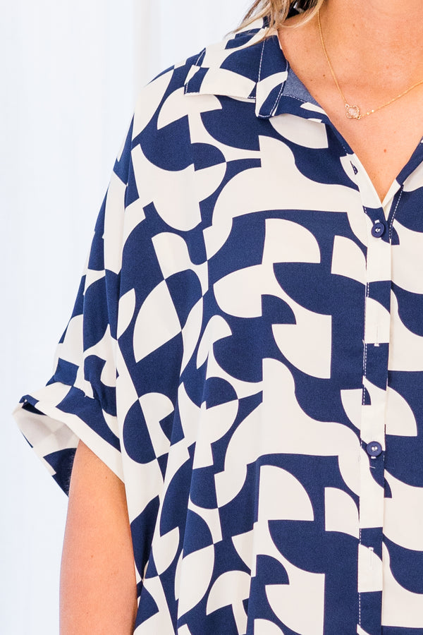 Chic Soul plus size clothing, short-sleeve collared navy top with button detailing and white abstract geometric pattern 