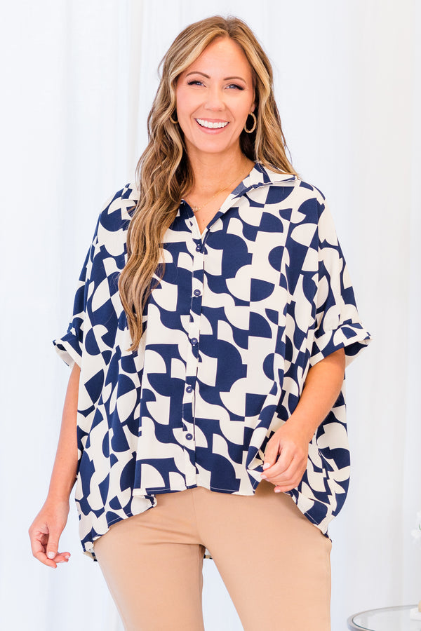 Chic Soul plus size clothing, short-sleeve collared navy top with button detailing and white abstract geometric pattern 