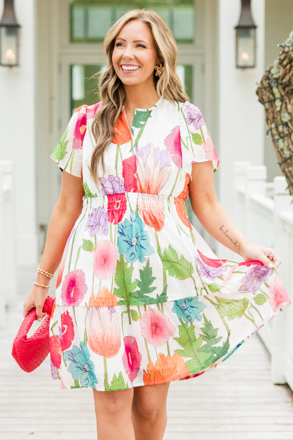 Chic Soul plus size clothing, short-sleeve ruffled pink dress with a split-v-neckline and a smocked waistline with a watercolor multicolored floral print 
