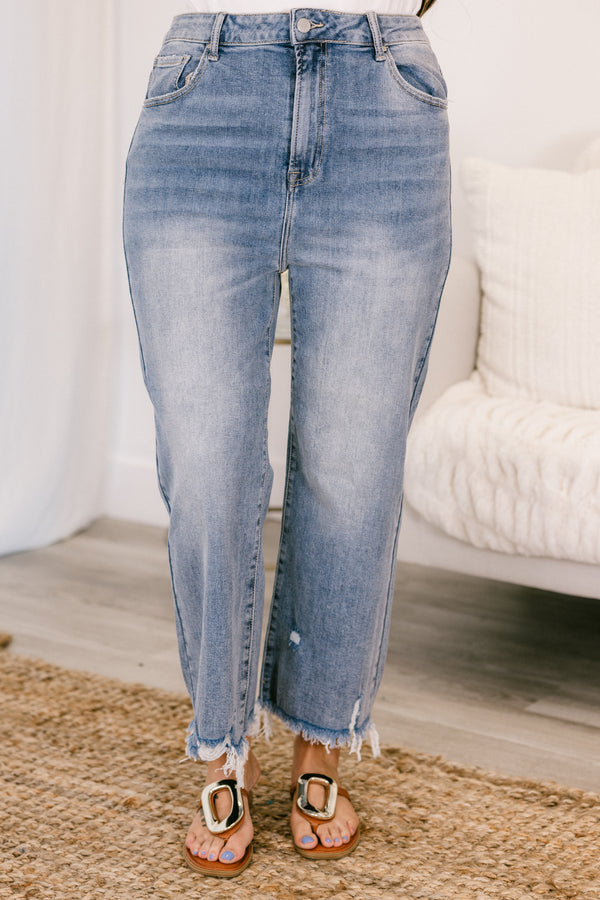 Chic Soul plus size clothing, high-waisted light wash straight leg cropped denim jeans with a distressed frayed hem and a silver button detailing 