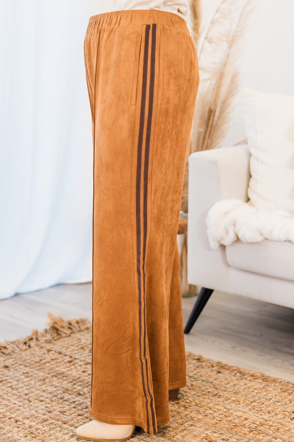 Chic Soul plus size clothing, brown pants that have two dark brown stripes on each side of the leg and a stretch waistband 