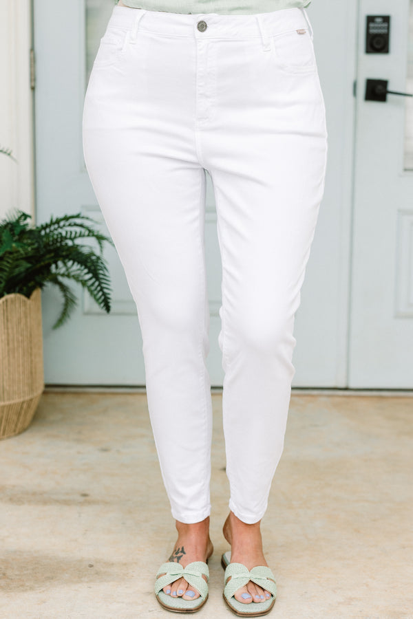 Chic Soul plus size clothing, high-waisted white skinny jeans with a silver button detailing 