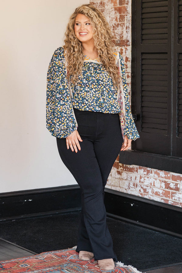Chic Soul plus size clothing, navy colored base long sleeve top with multi prints orange florals and red bandana style pattern at inner sides of sleeves and orange colored around neckline and lace bodice structure