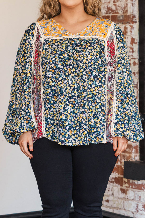 Chic Soul plus size clothing, navy colored base long sleeve top with multi prints orange florals and red bandana style pattern at inner sides of sleeves and orange colored around neckline and lace bodice structure