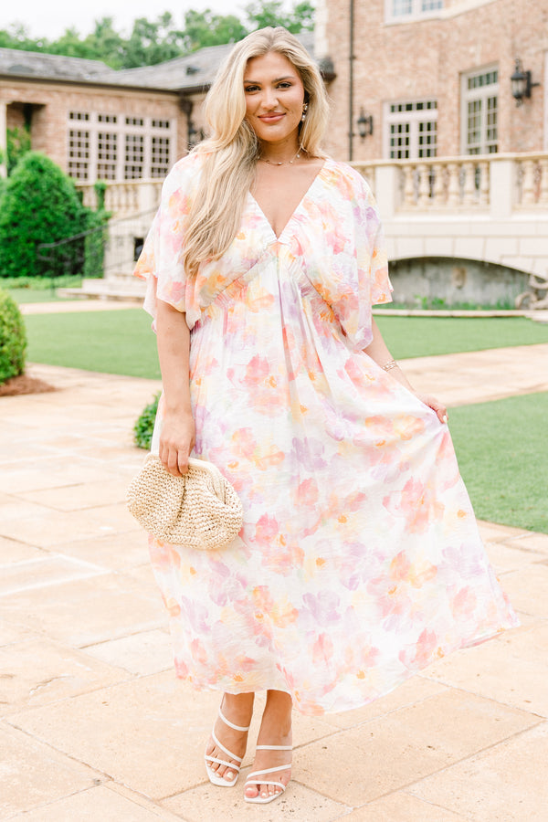 Chic Soul Plus size clothing, white midi dress with a multi color floral pattern a deep v-neckline and flowy short sleeves
