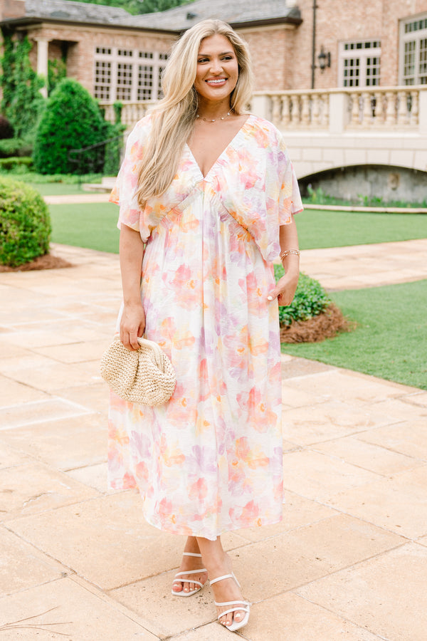 Chic Soul Plus size clothing, white midi dress with a multi color floral pattern a deep v-neckline and flowy short sleeves
