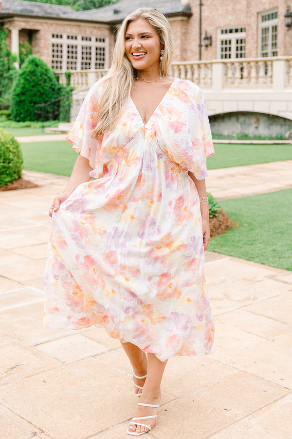 Chic Soul Plus size clothing, white midi dress with a multi color floral pattern a deep v-neckline and flowy short sleeves
