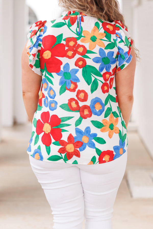 Chic Soul plus size clothing, white top with multicolor floral pattern and flutter sleeves
