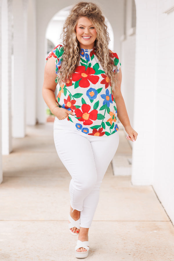 Chic Soul plus size clothing, white top with multicolor floral pattern and flutter sleeves