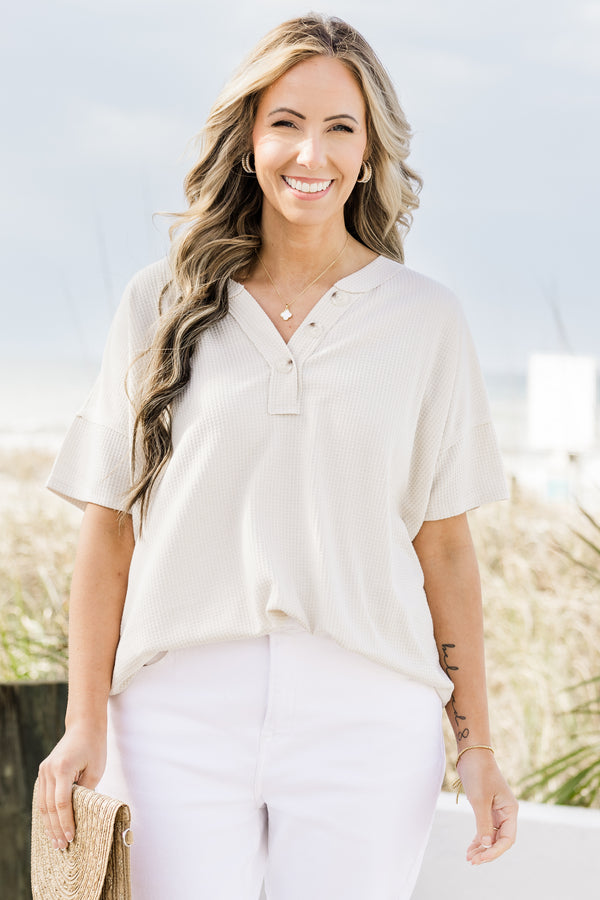 Chic Soul plus size clothing, oatmeal short sleeve top with a three buttons on the v-neckline and a waffle textured pattern 
