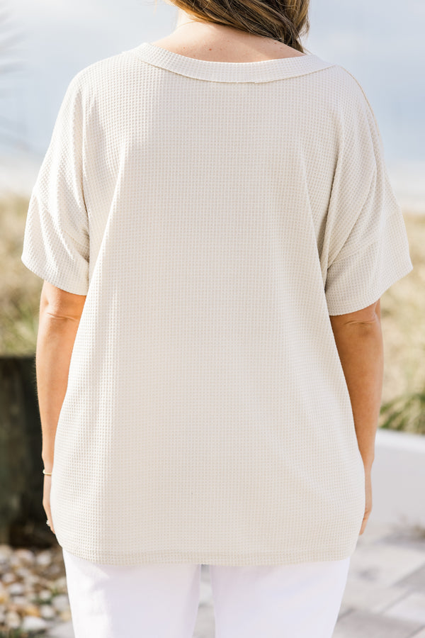 Chic Soul plus size clothing, oatmeal short sleeve top with a three buttons on the v-neckline and a waffle textured pattern 
