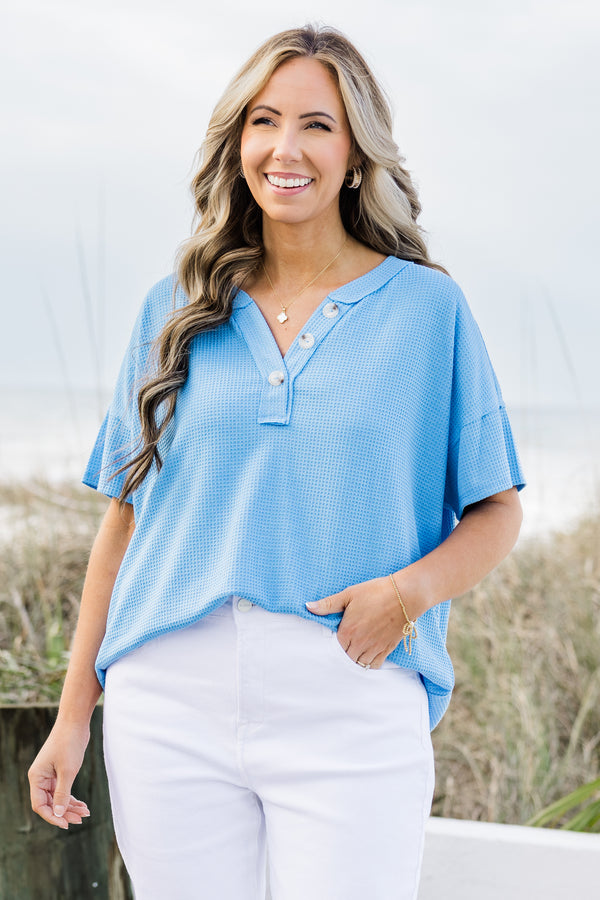 Chic Soul plus size clothing, ocean blue short sleeve top with a three buttons on the v-neckline and a waffle textured pattern 

