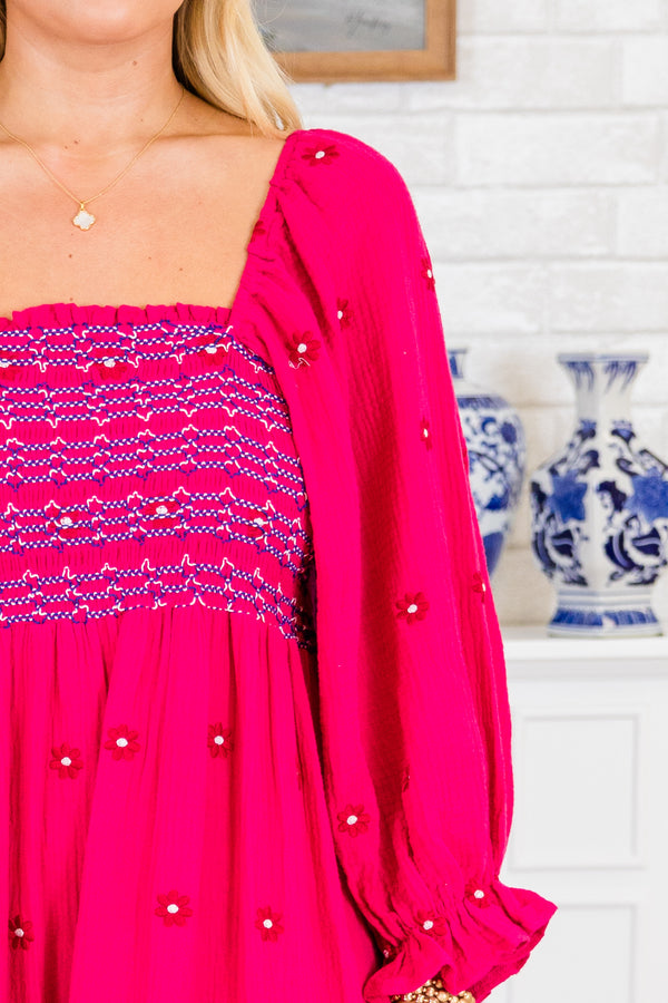 Chic Soul plus size clothing, long-sleeve hot pink midi dress with a smocked bodice and a square neckline with subtle multi-colored spotted floral pattern