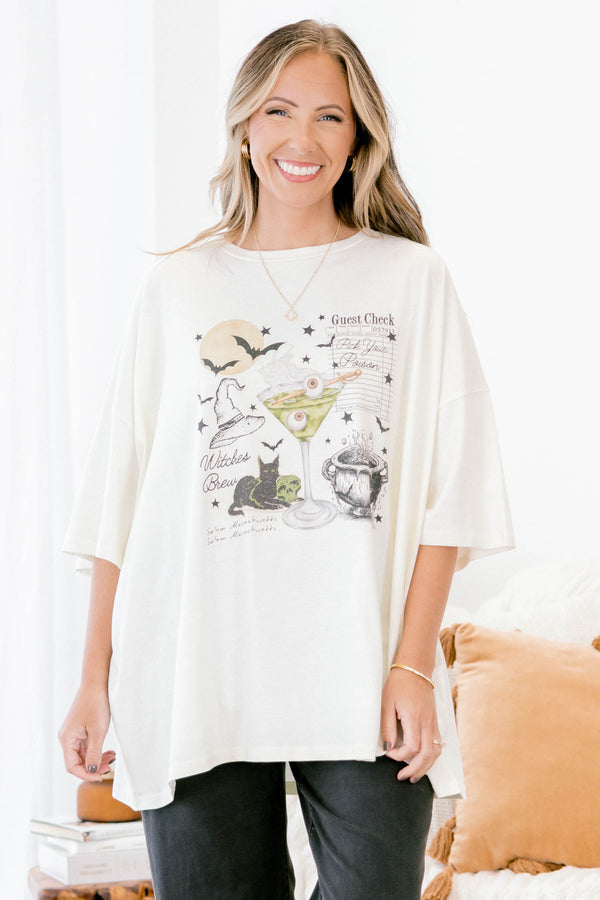 Chic Soul plus size clothing, ivory short sleeve boyfriend tee with a black cat, martini with eyeballs, bats, and other Halloween graphics on the front