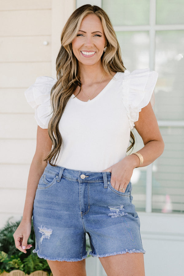 Chic Soul plus size clothing, medium wash distressed denim shorts with frayed hemlines