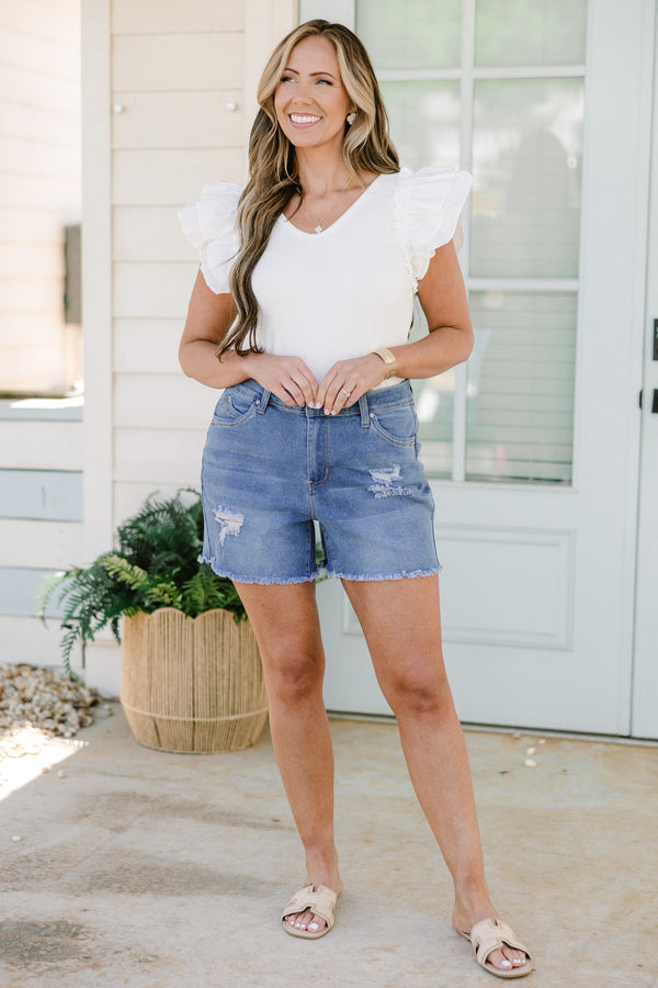 Chic Soul plus size clothing, medium wash distressed denim shorts with frayed hemlines