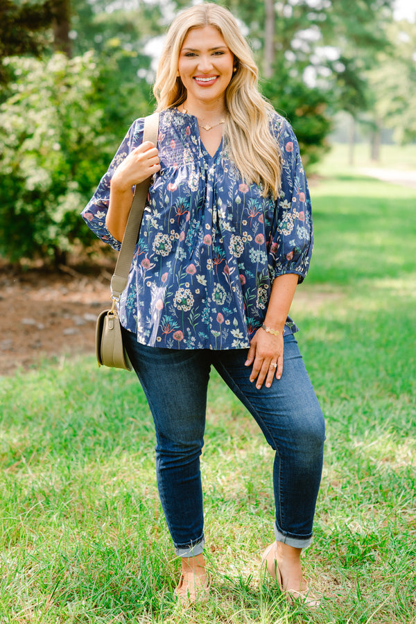 Chic Soul plus size clothing, dusty blue top with bubble sleeves and a floral pattern throughout 