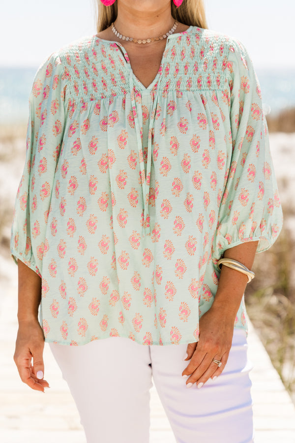 Chic Soul plus size clothing, turquoise three quarter length sleeve flowy top with v neckline with tie detail with pink floral print 