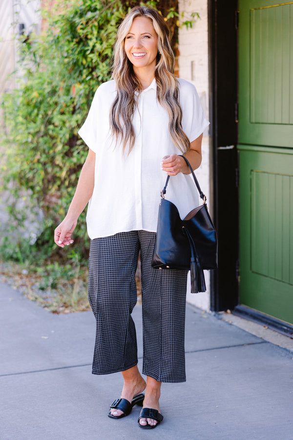 Plus Size ivory short-sleeve button-down top in a textured air flow fabric.