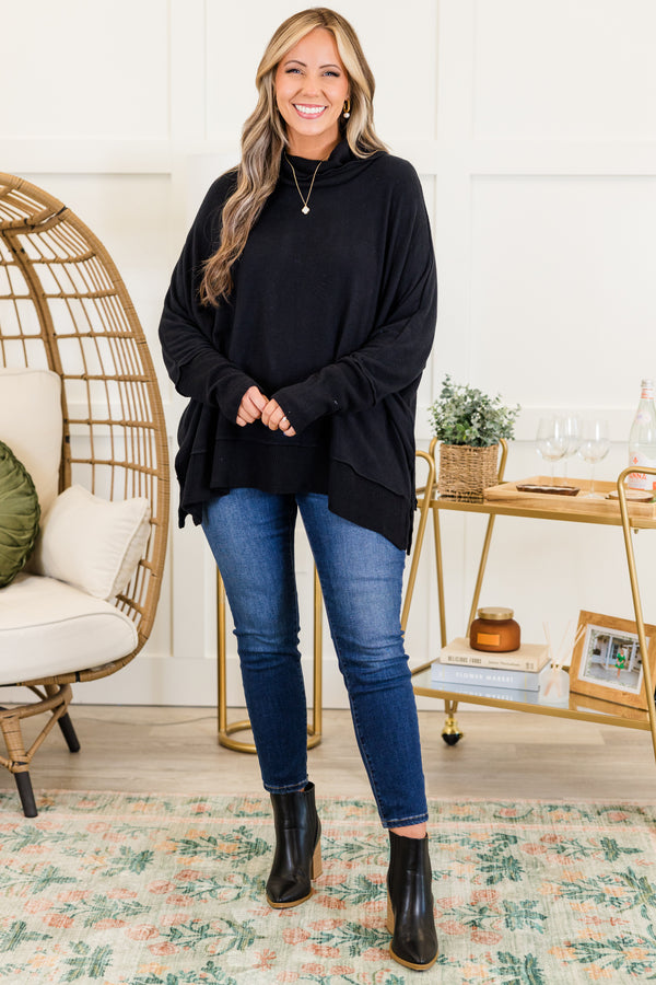 Chic Soul plus size clothing, black long sleeve flowy top with ribbed cuff sleeves with ribbed band along the bottom with slit with cowl turtleneck detail