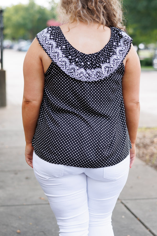 Chic Soul plus size clothing, black flowy top with white polka dot pattern and ruffles and lace embroidery on neckline