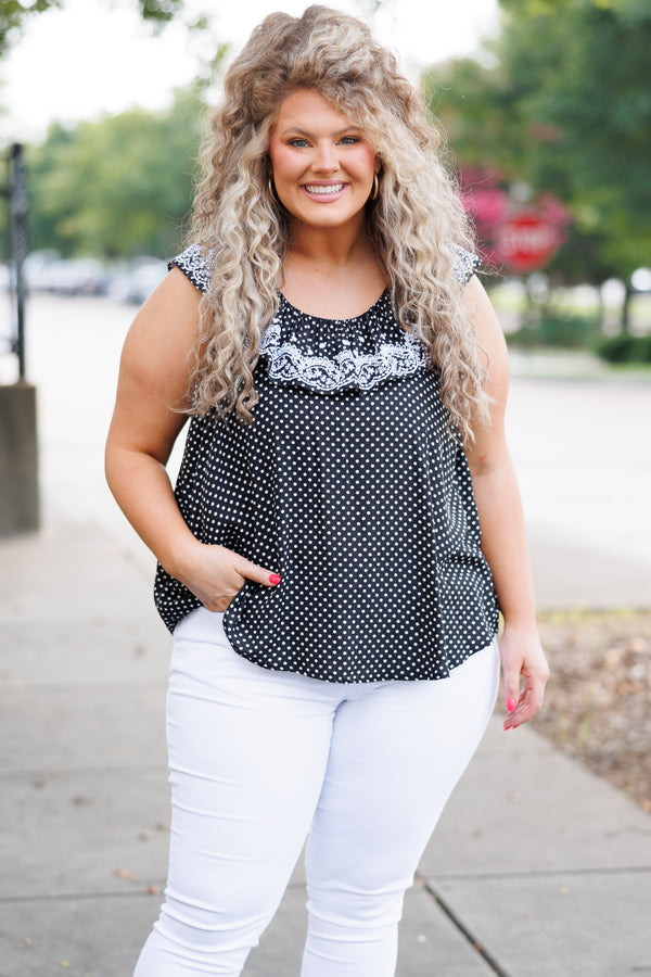 Chic Soul plus size clothing, black flowy top with white polka dot pattern and ruffles and lace embroidery on neckline