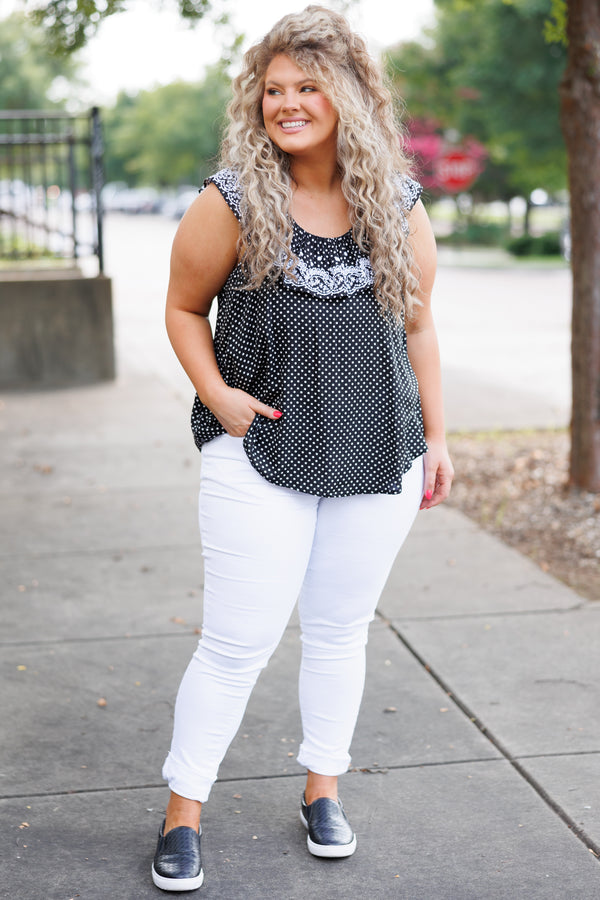 Chic Soul plus size clothing, black flowy top with white polka dot pattern and ruffles and lace embroidery on neckline